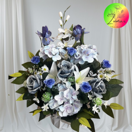 3.	Centro de flores artificiales con flores azules y verdes decorativos para lápidas