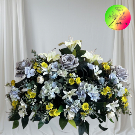 centro funebre en tonos amarillos y azules, con flores artificiales. Envios a toda España