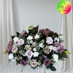 centro para cementerio con flores artificiales en tonos malvas